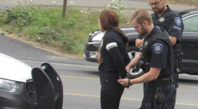 Lady arrested 1 scaled e1598578134219