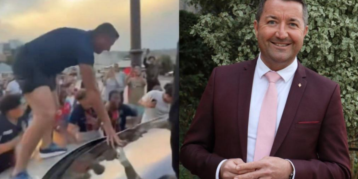 Le député Karl Olive monte sur le capot d&rsquo;une voiture après la victoire du PSG en finale de Ligue des champions